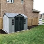 Lifetime 10' x 8' outdoor garden shed installation in Toronto backyard.